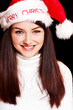 Pretty woman wearing santa hat