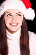 Pretty woman wearing santa hat
