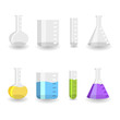 Different chemistry beakers empty and full with colored liquids