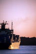 cargo ship freighter in sunset