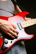 man playing electrical guitar
