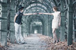 Young couple in a park stretching hands. Young couple in a park stretching hands.