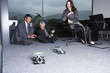 Photo: Businessmen playing with toys Businessmen playing with toys