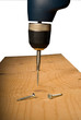 Installing screw with power drill Installing screw with power drill