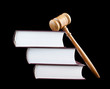 Judge's gavel and stack of legal books isolated