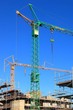 Baukrane, Krane, Hochbau, Hausbau, himmelblau
