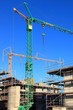 Baukrane, Krane, Hochbau, Hausbau, himmelblau