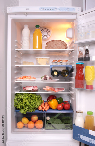 Photo: refrigerator full with some kinds of food refrigerator full with some kinds of food