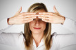 woman hiding her eyes