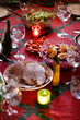 Christmas table with roasted pork on the plate Christmas table with roasted pork on the plate