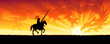 Knight riding towards the sunset sky dragon