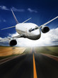 Photo: the airplane with the blue sky background. the airplane with the blue sky background.