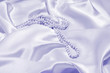 Pearls a necklace on a silk fabric