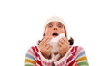 woman sneezing to a tissue woman sneezing to a tissue