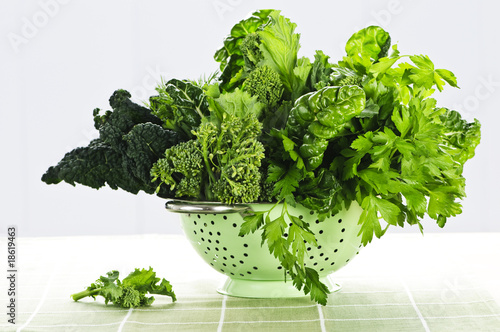 Photo: Dark green leafy vegetables in colander Dark green leafy vegetables in colander