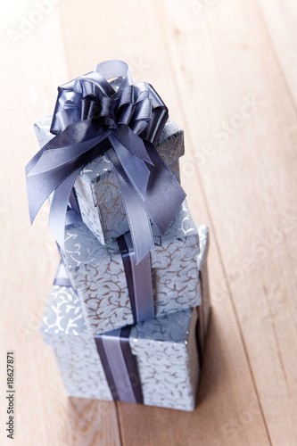 Photo: blue gift box with a red tape blue gift box with a red tape