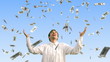 man and falling dollars