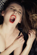 young woman shouting in ecstasy