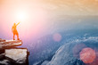 Achievement. Man figure standing on top of a cliff. Achievement. Man figure standing on top of a cliff.