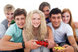 Portrait of teenagers playing video games in the living-room Portrait of teenagers playing video games in the living-room