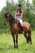 Brunette girl with horse
