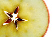 Translucent slice of an apple Translucent slice of an apple