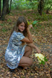Young pretty woman in the autumn park