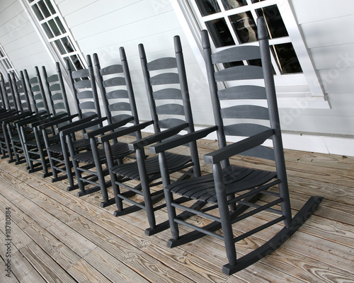 Photo: Rocking chairs lined up on the porch Rocking chairs lined up on the porch