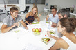 Photo: Young coworkers having lunch Young coworkers having lunch