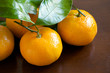 Mandarin Oranges on Wooden Table