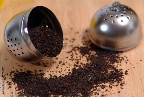 Photo: some organic black tea powder on a timber board some organic black tea powder on a timber board