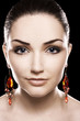 Beautiful woman wearing earrings