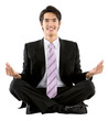 Business man doing yoga