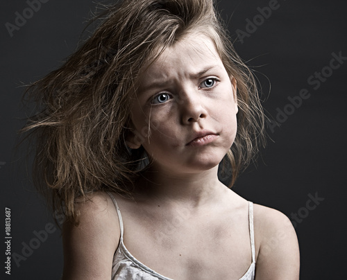 Photo: Messy Child against a Grey Background Messy Child against a Grey Background