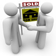 Buyer and Seller Handshake - For Sale Sign