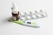 Thermometer, pills and nose drops Thermometer, pills and nose drops