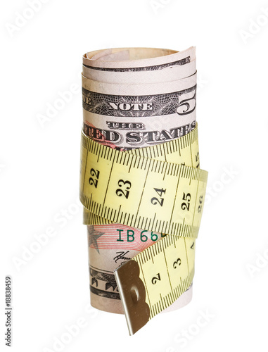 Photo: A dollars with a tape measure wrapped around. A dollars with a tape measure wrapped around.