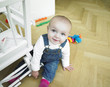 Baby Playing Near Chair