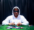 a poker player sitting at a table