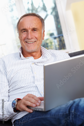 mature man with laptop