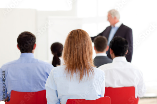 Photo: Senior manager giving a presentation Senior manager giving a presentation