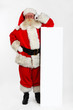 Santa leaning on banner