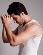 young man showing his muscular body young man showing his muscular body
