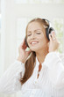 Young woman listening music