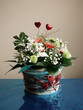 Flowers arrangement on blue table