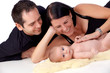 Happy parents with new born baby