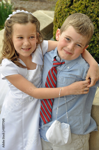 Photo: first communion day hug first communion day hug