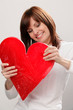 Happy woman repairing broken heart