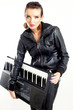 punk rock fashion girl holding a piano keyboard punk rock fashion girl holding a piano keyboard