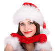 Christmas girl in santa hat with hand. Isolated.